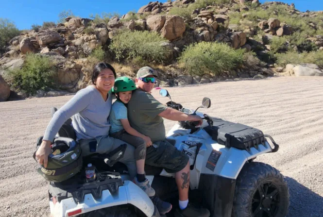 Charm with her family on an outdoor adventure